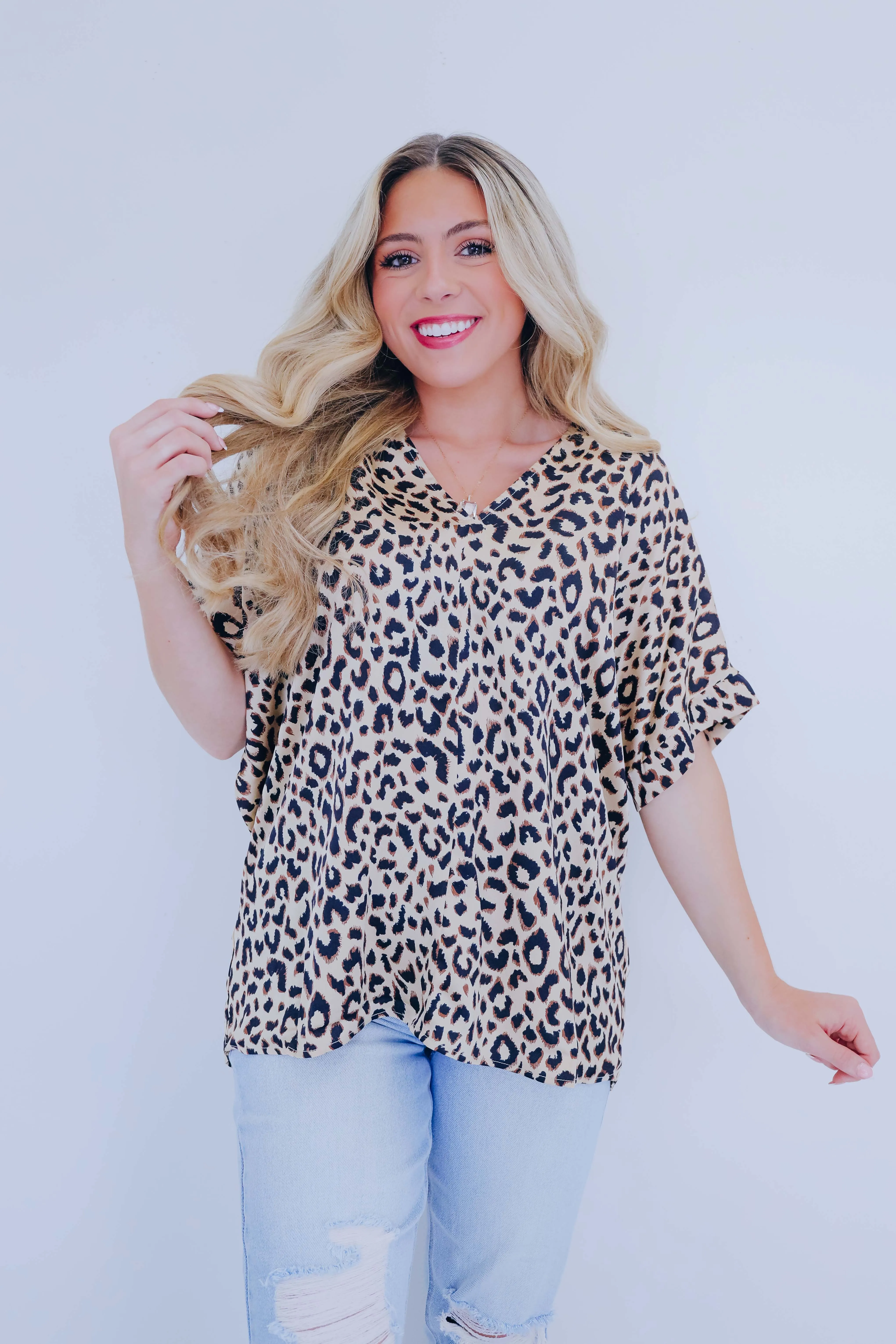 Angie Animal Print V-Neck Blouse